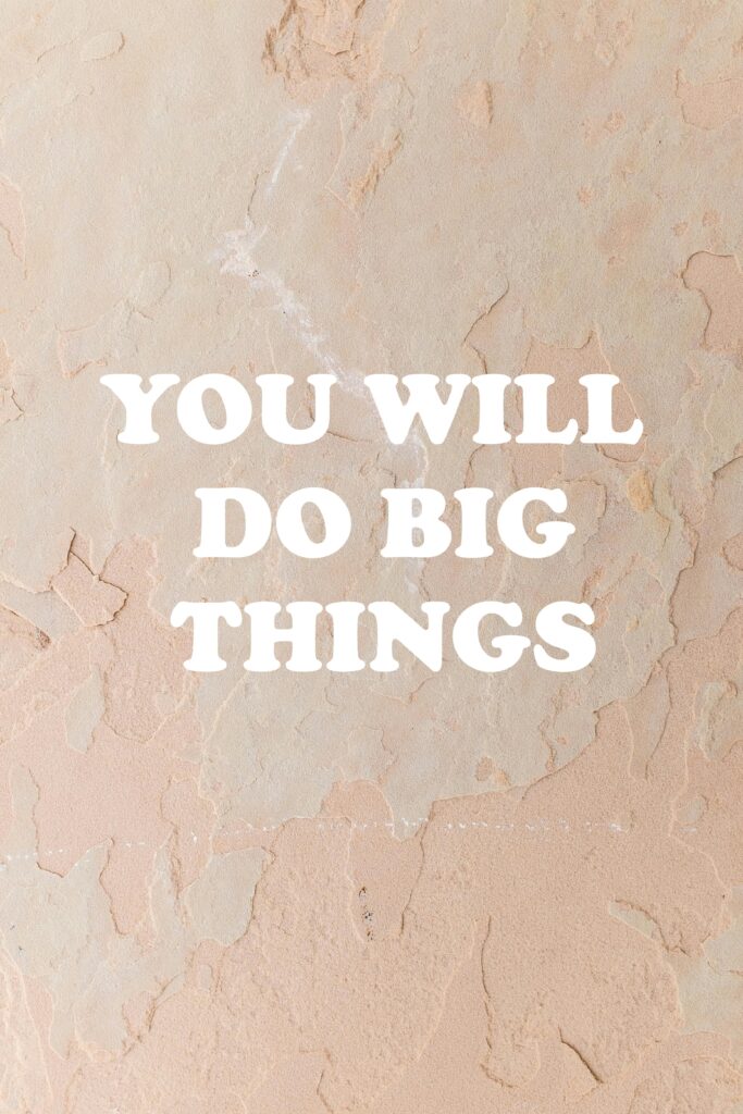 Minimalist image with empowering text 'YOU WILL DO BIG THINGS' on a textured background.