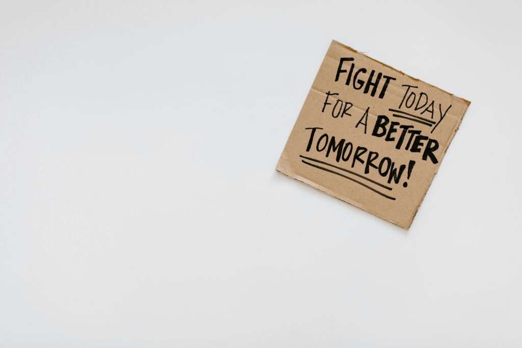 pexels-photo-8850723-8850723-1 Handwritten motivational message on cardboard for a better future.
