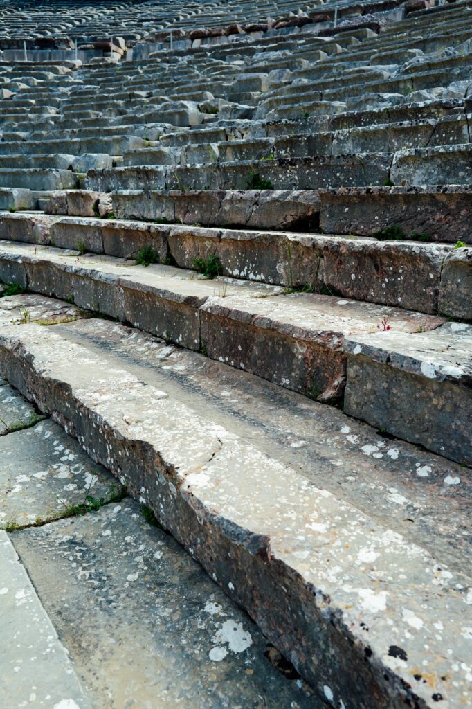 pexels-photo-32599341-32599341 Detailed view of ancient stone steps in a historic amphitheater, showcasing weathered textures.